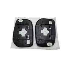 Two black car key fobs on a white background