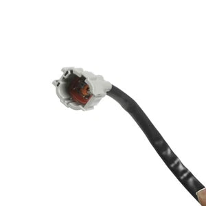 Close-up of a black cable with a metallic connector on a white background