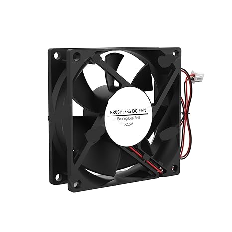 Black brushless DC fan with two wires on a white background