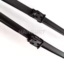 Two black metal brackets on a white background
